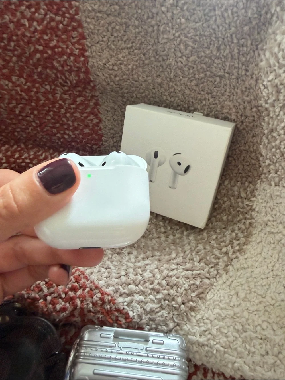 Apple AirPods 4 with two protective cases bundle